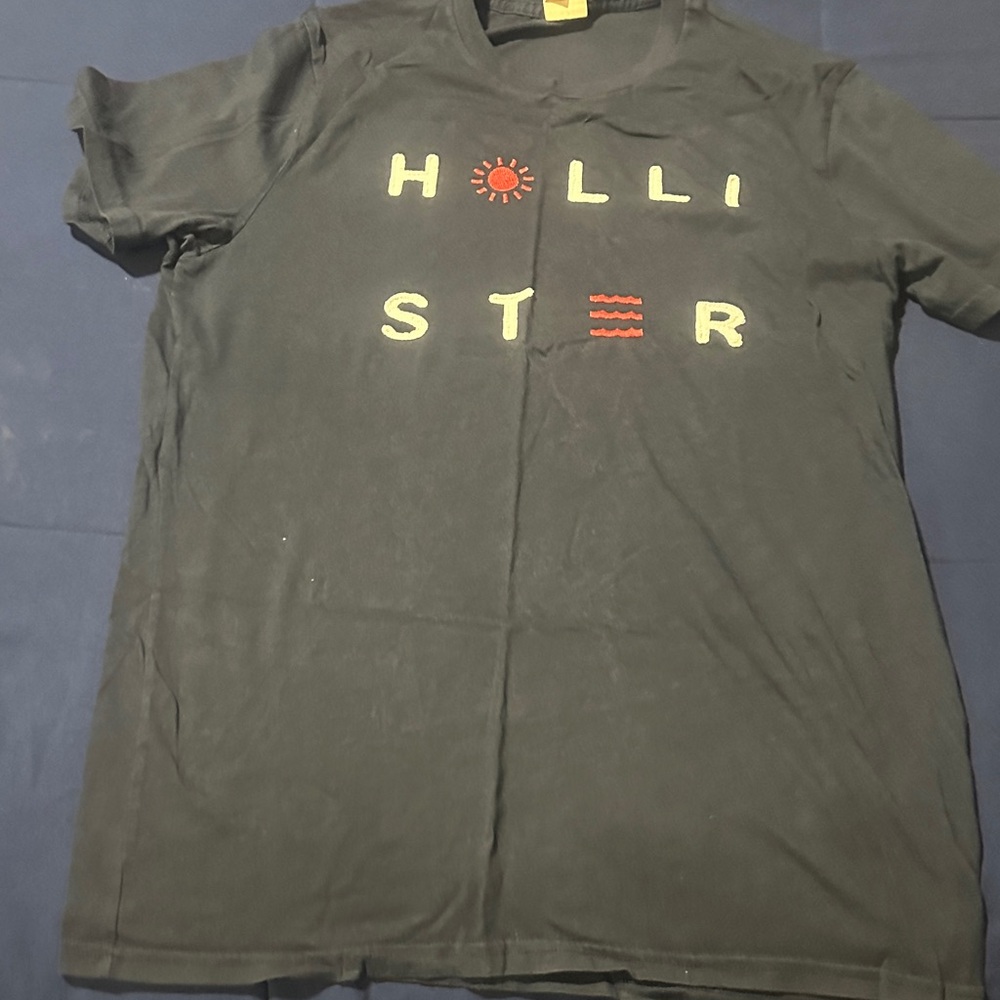 Hollister Black Tee with Red and Yellow Accents